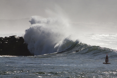 surfing big wave